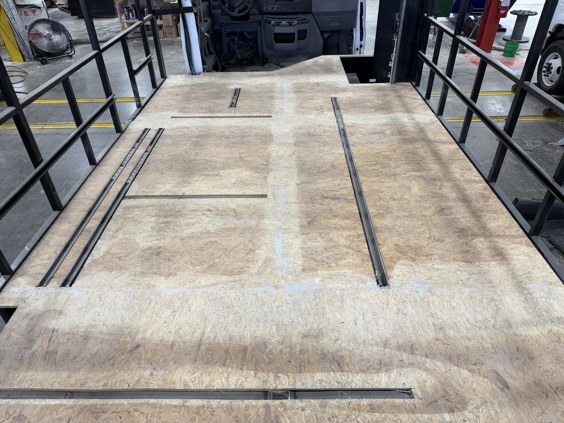 Composite subfloor with seat track