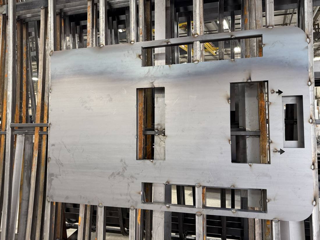 Laser-cut steel plate welded into the roof structure for the air-conditioning unit