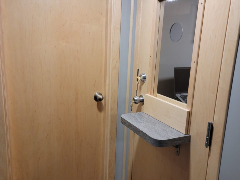Dispensing door with pass-through window and shelf