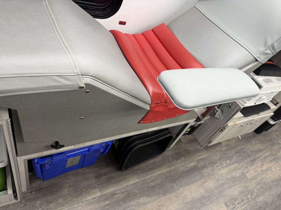 Donor chair in a bloodmobile, red upholstery