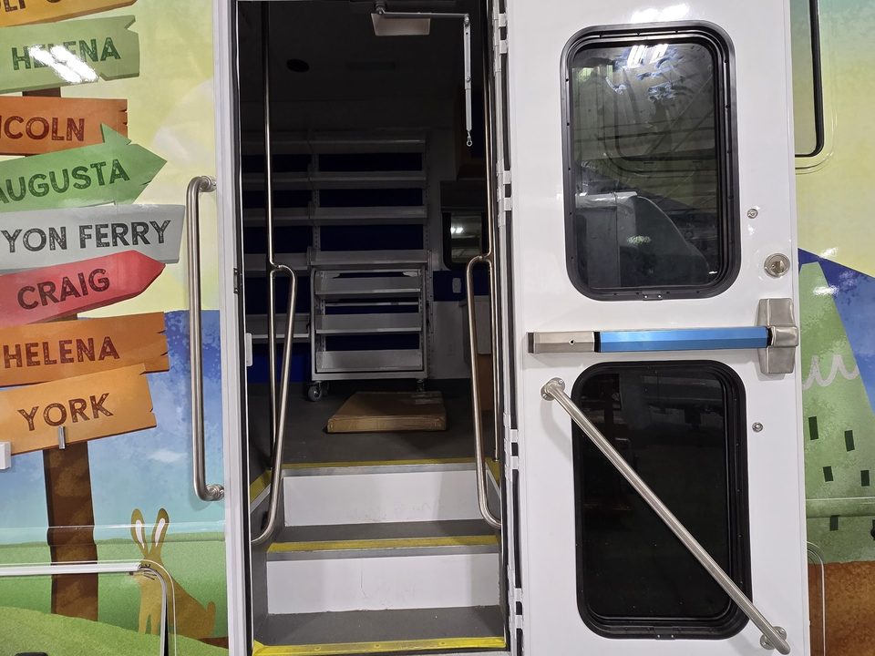 Bookmobile curbside entry door with steps