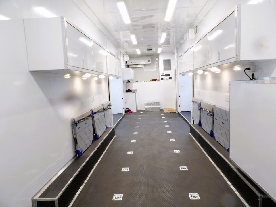 Training lab trailer interior with benches