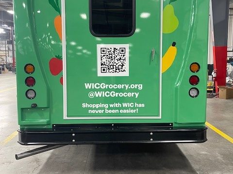 Mobile market, rear, green wrap
