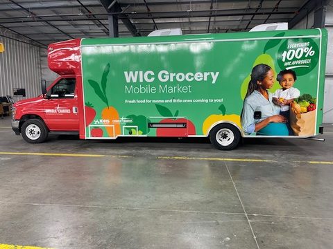 Mobile market, passenger side, green WIC Grocery wrap