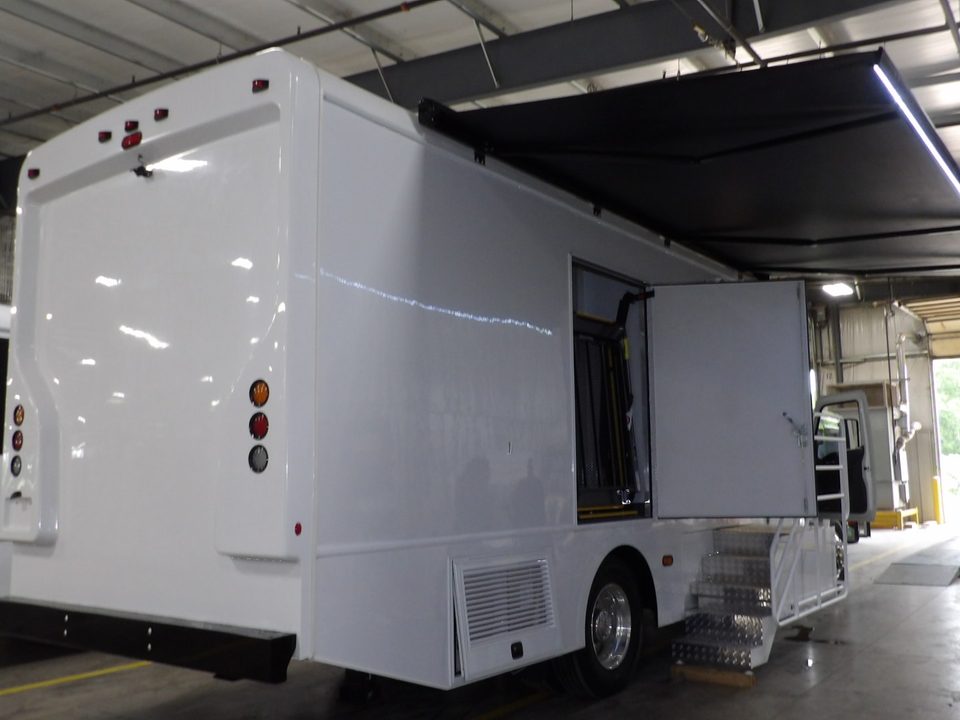 Mobile mammography unit, rear three-quarter, patient door open