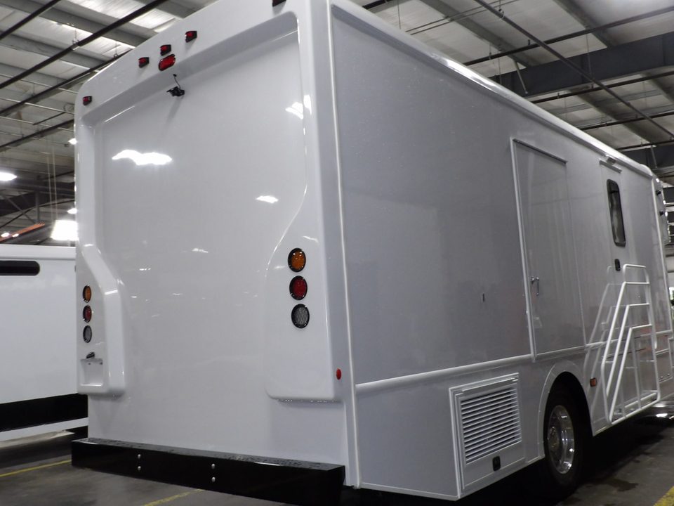 Mobile mammography unit, rear three-quarter, patient stairs deployed