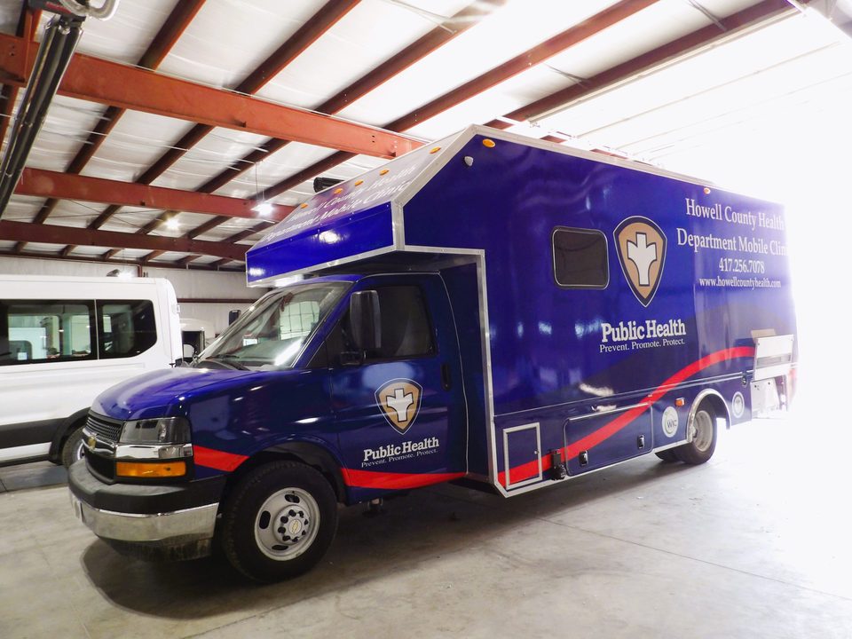 Mobile public-health clinic, front three-quarter view in the HLE plant