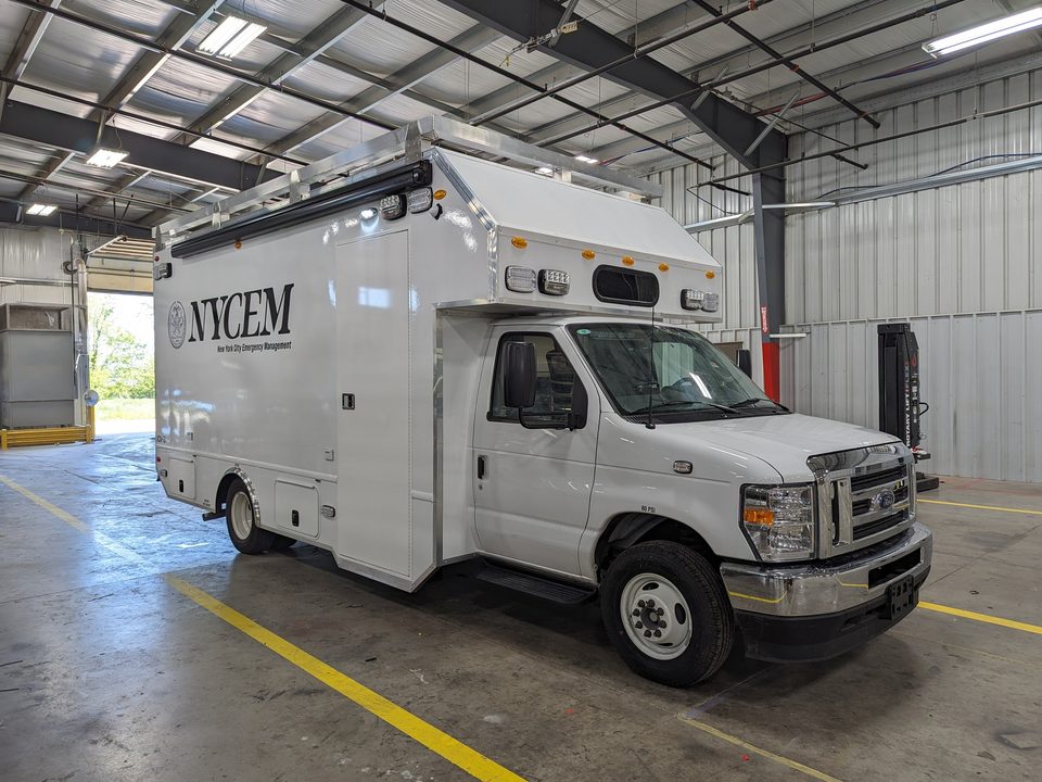 Mobile command unit on a Ford E-450 cutaway, wrapped, in the HLE plant