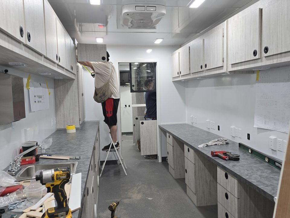 Command trailer interior in production: work counters and cabinets