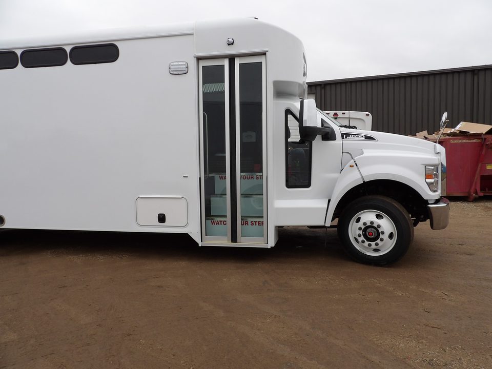 Prisoner transport curbside entry door marked watch your step