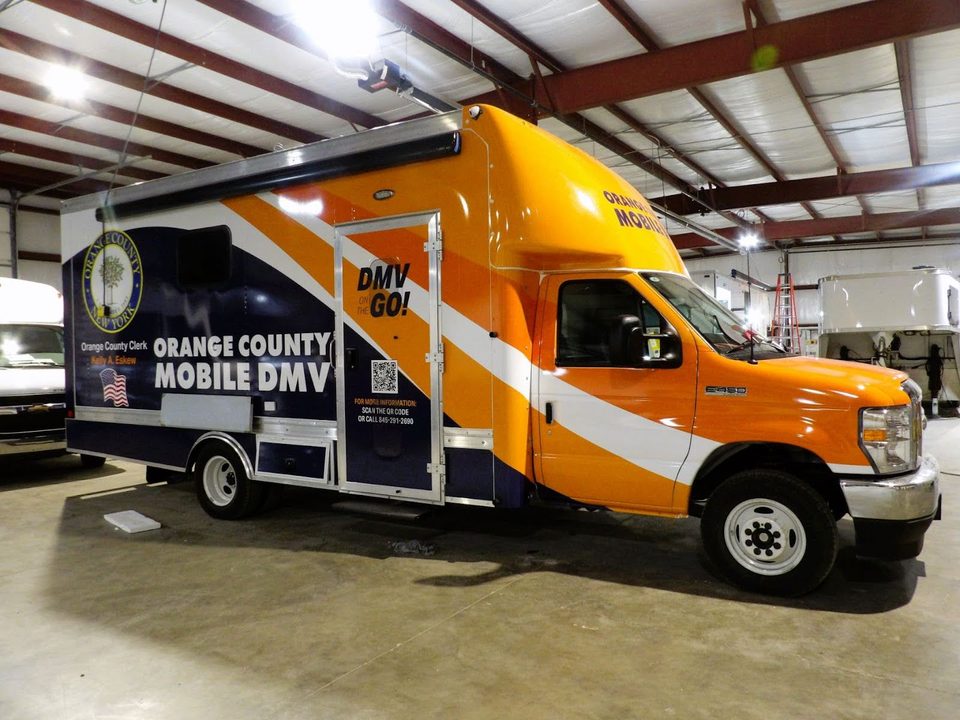 Mobile DMV office on a Ford E-450 cutaway, wrapped, in the HLE plant