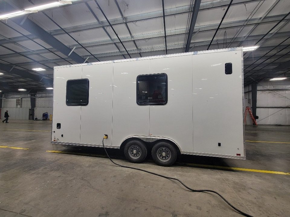 Medical trailer, front three-quarter, in the plant