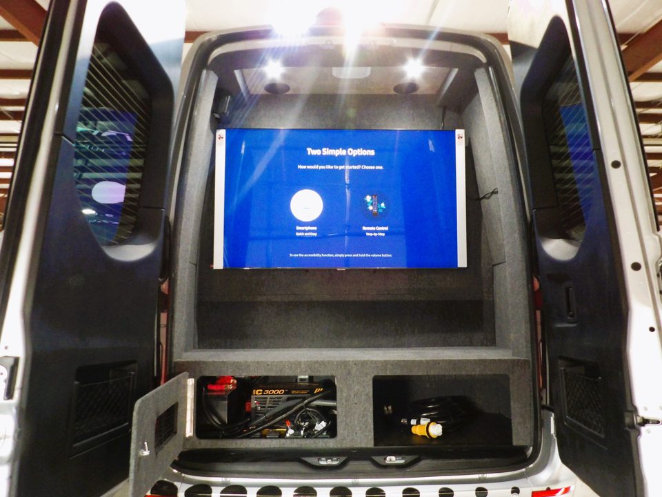 Rear doors open: display screen above the generator bay
