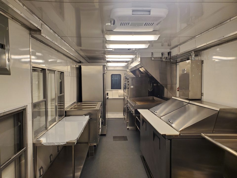 Food truck kitchen: stainless counters and hood