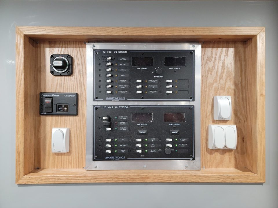 Power distribution panel in an oak frame