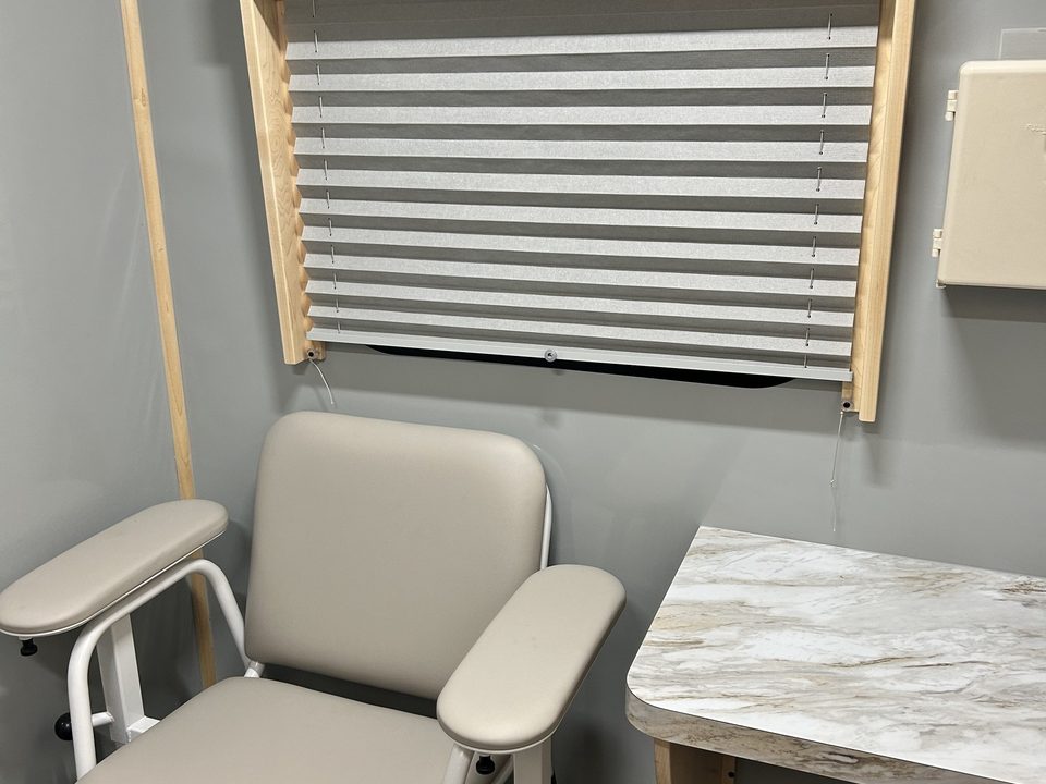 Exam room with patient chair inside the clinic