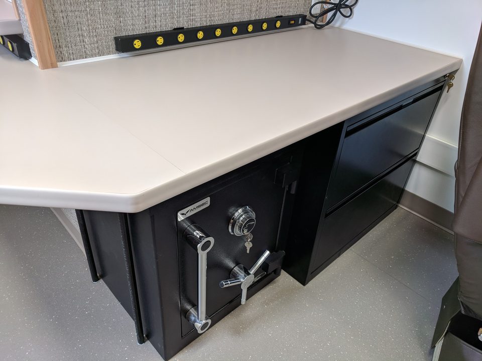 Treatment clinic counter with safe