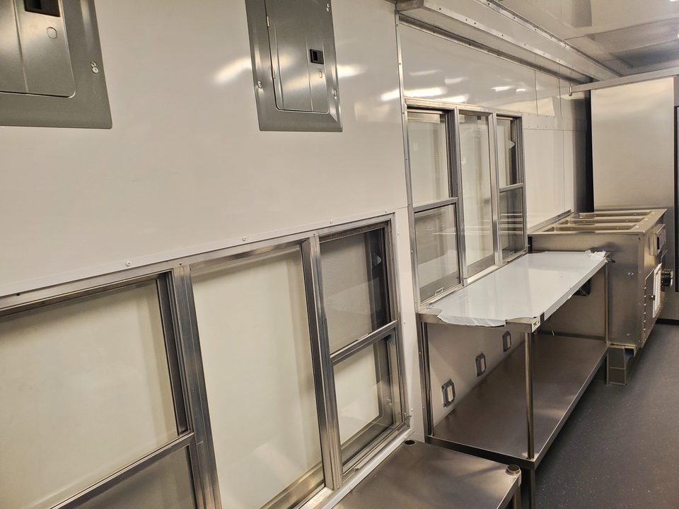 Mobile kitchen interior, serving window side