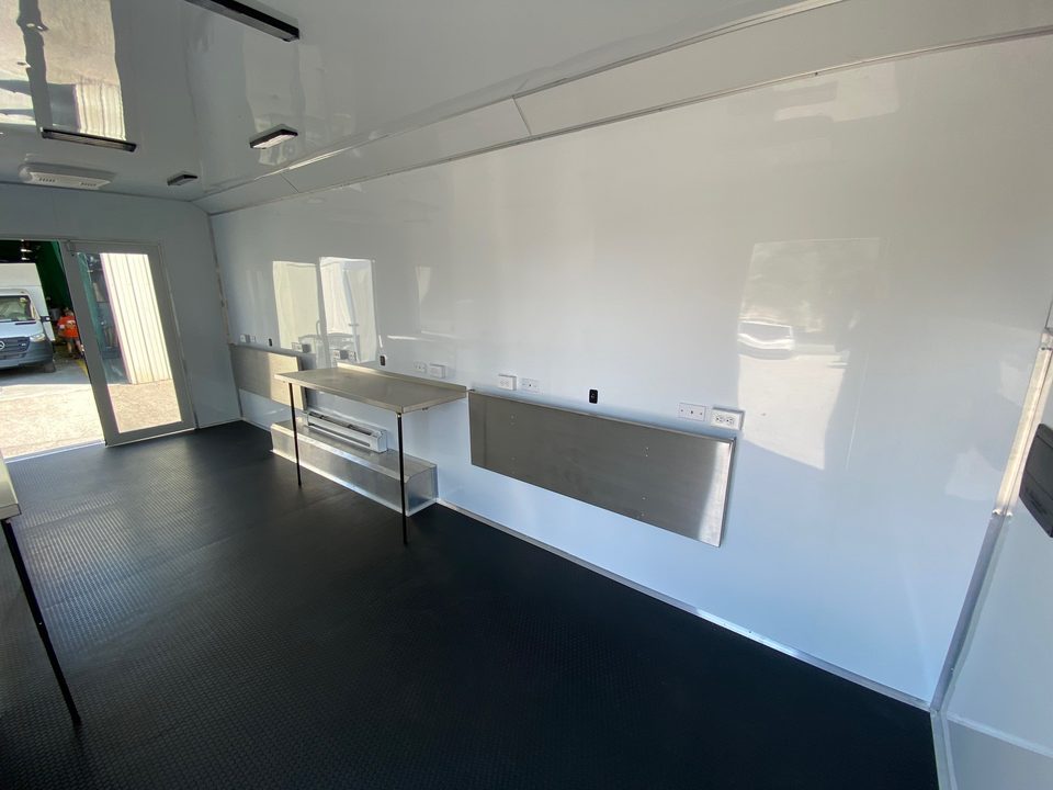 Training trailer interior: benches and cabinets