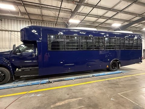 Prisoner transport bus, side, barred windows