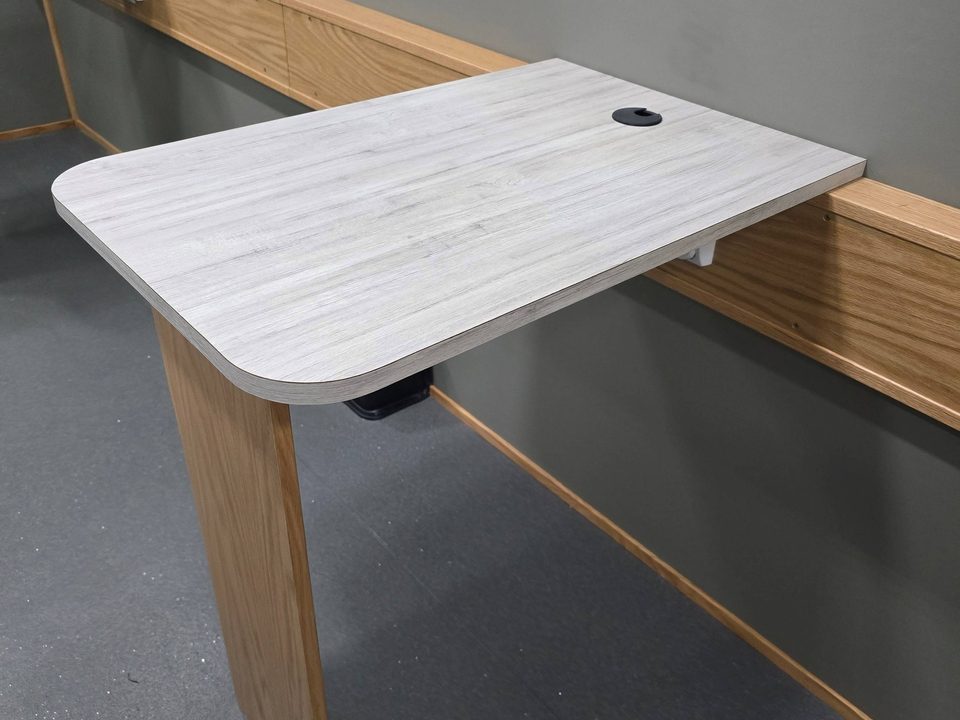 Fold-down work table on the wall inside the outreach unit
