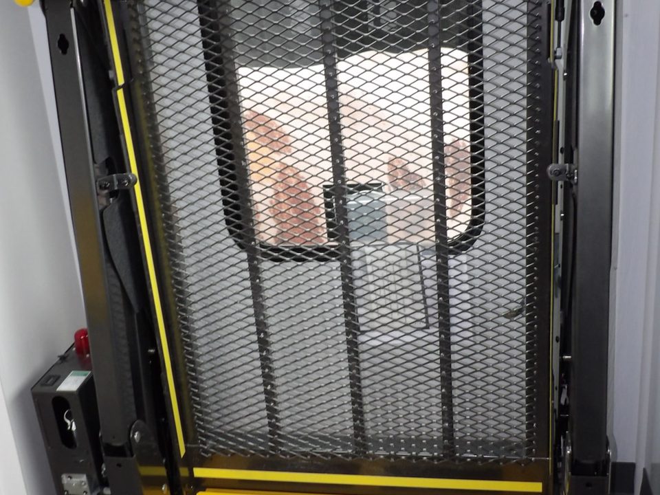 Wheelchair lift stowed inside the outreach unit