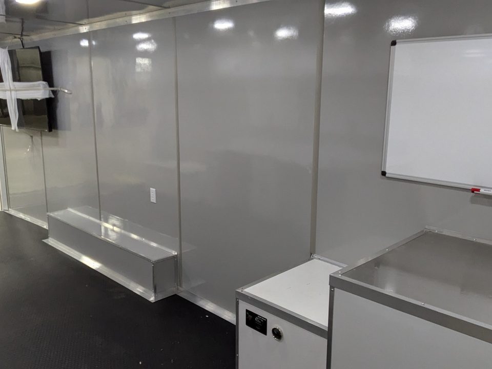 Command trailer interior: counters, whiteboard, display