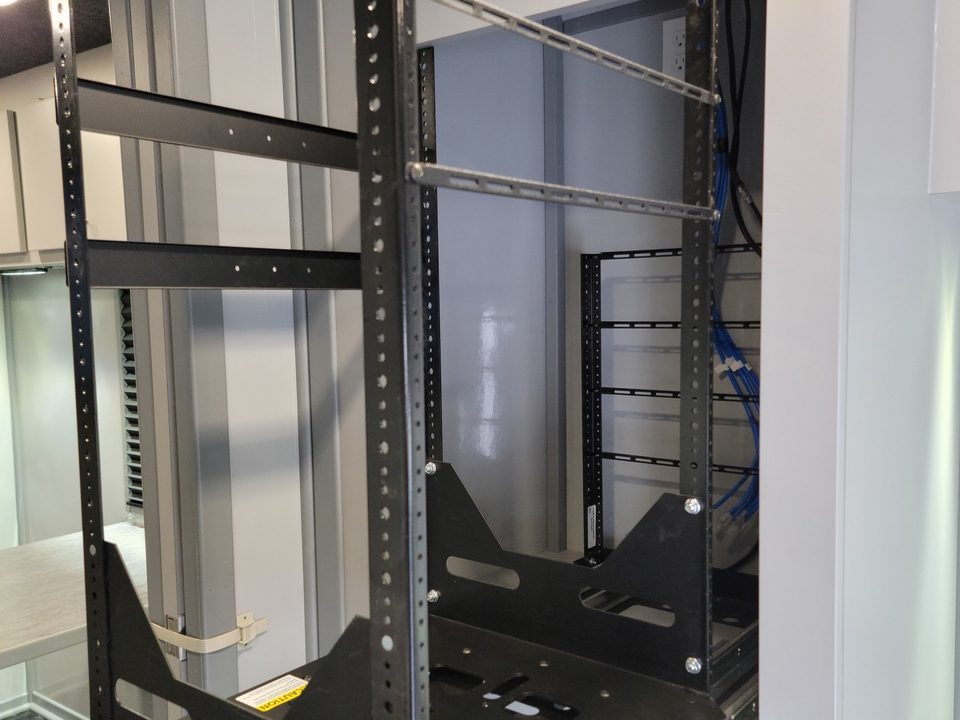 Slide-out equipment rack inside the response unit