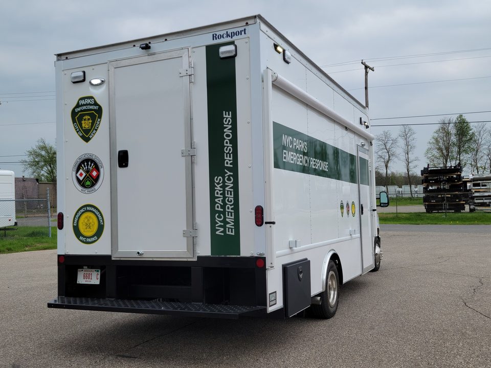 Emergency response unit, rear three-quarter, rear door with agency seals