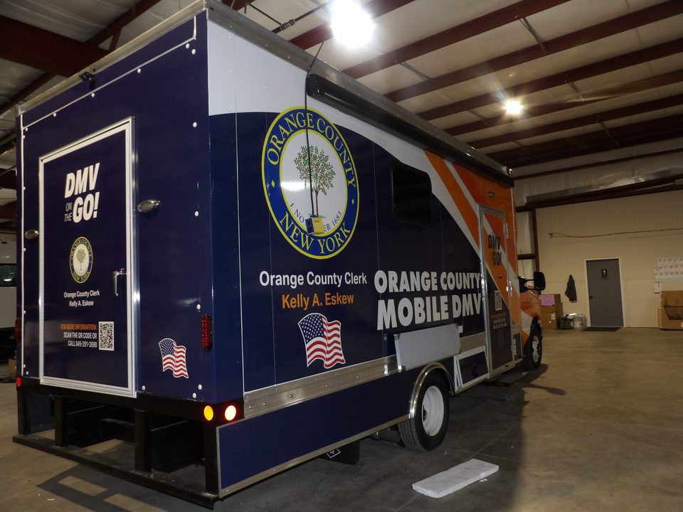Mobile DMV office, passenger side, wrapped