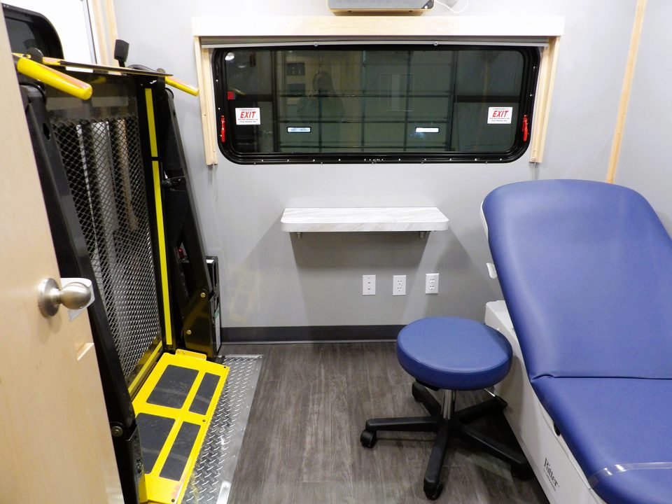 Wheelchair lift at the door beside the exam room