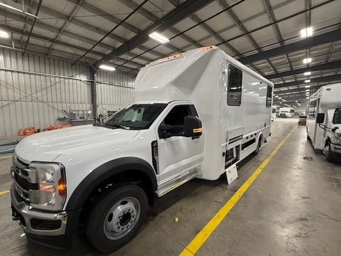 Mobile office on a Ford F-550, front three-quarter, in the HLE plant