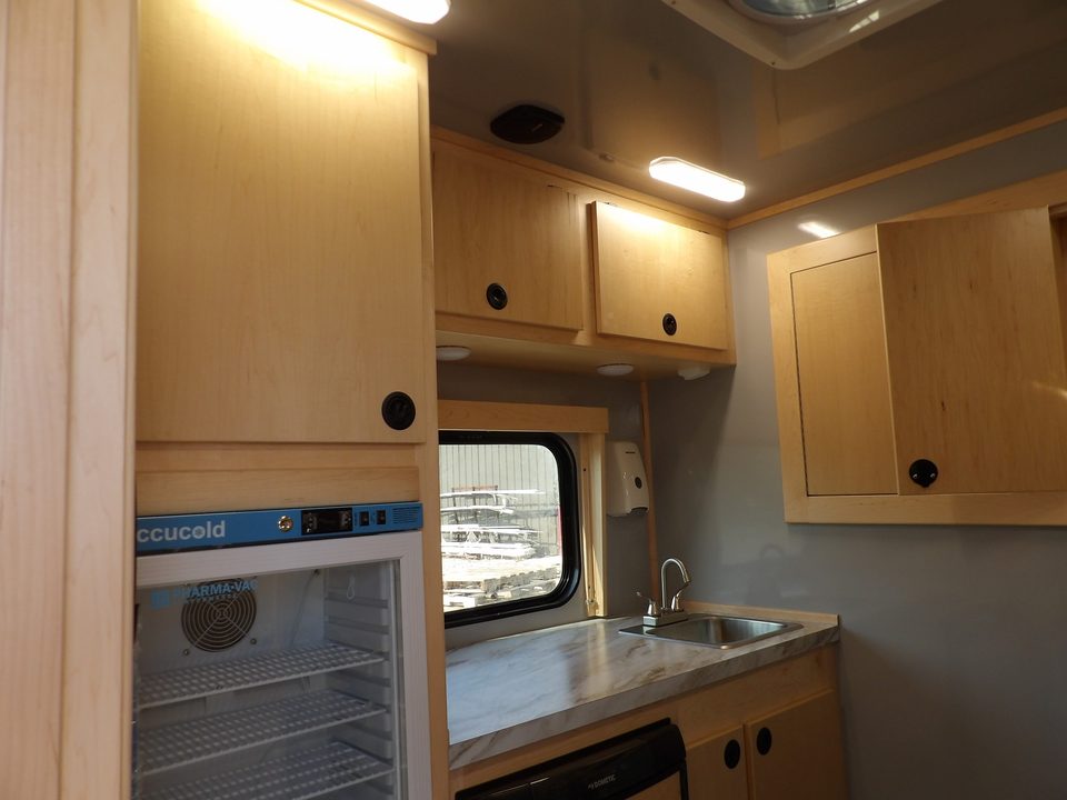 Mobile clinic counter, sink and refrigerator