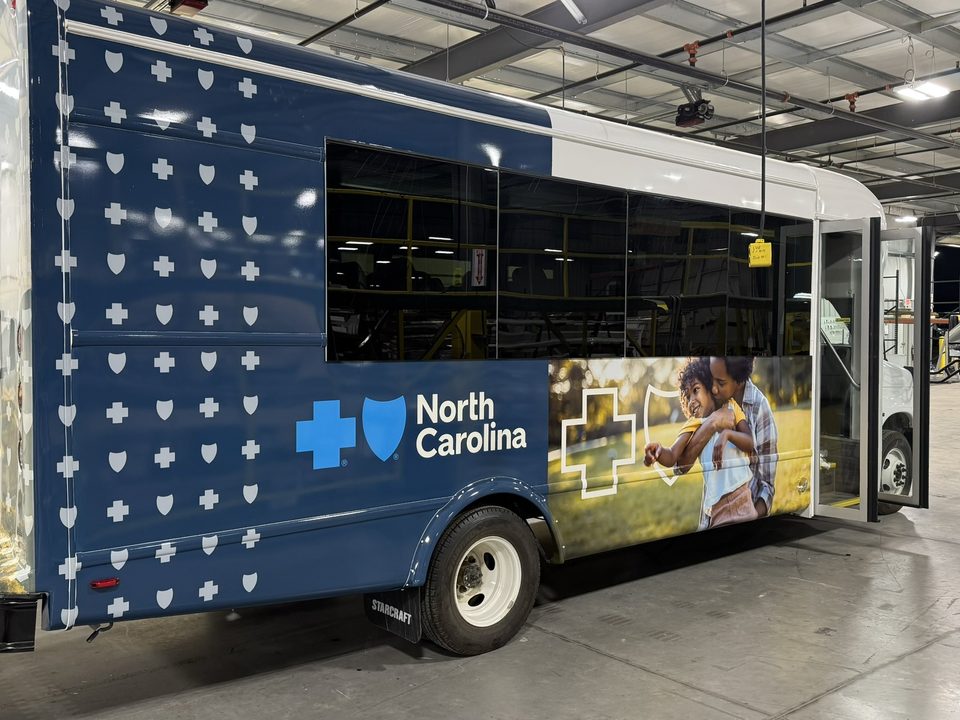 Mobile outreach unit, wrapped, in the HLE plant