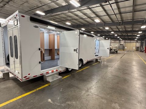 Voting trailer, rear three-quarter, rear and side doors open