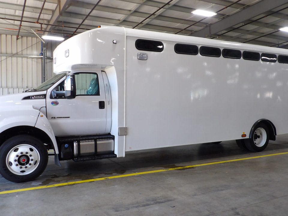 Prisoner transport vehicle on a Ford F-650, white, before graphics, in the HLE plant