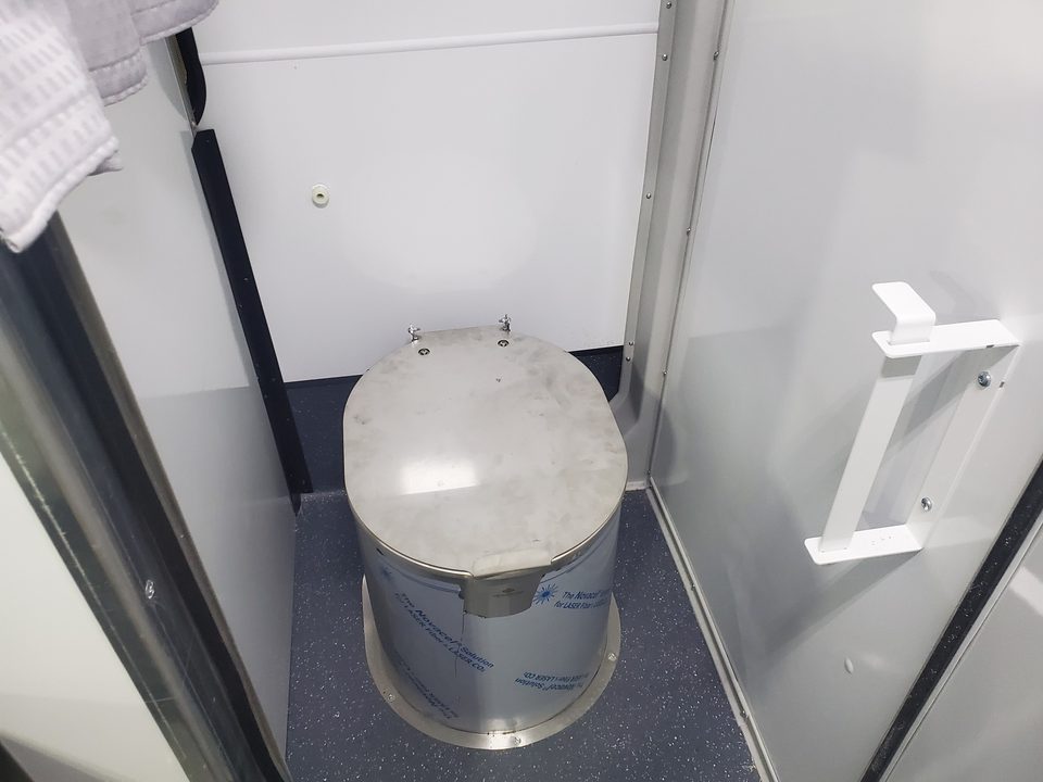 Prisoner transport secure restroom
