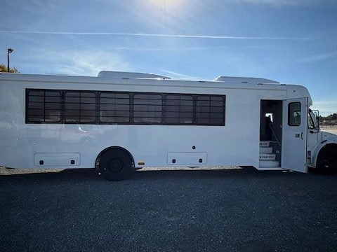 38-passenger prisoner transport on a Freightliner S2C, passenger side