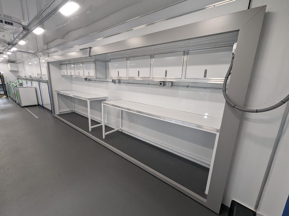 Lab trailer interior: work benches the full length