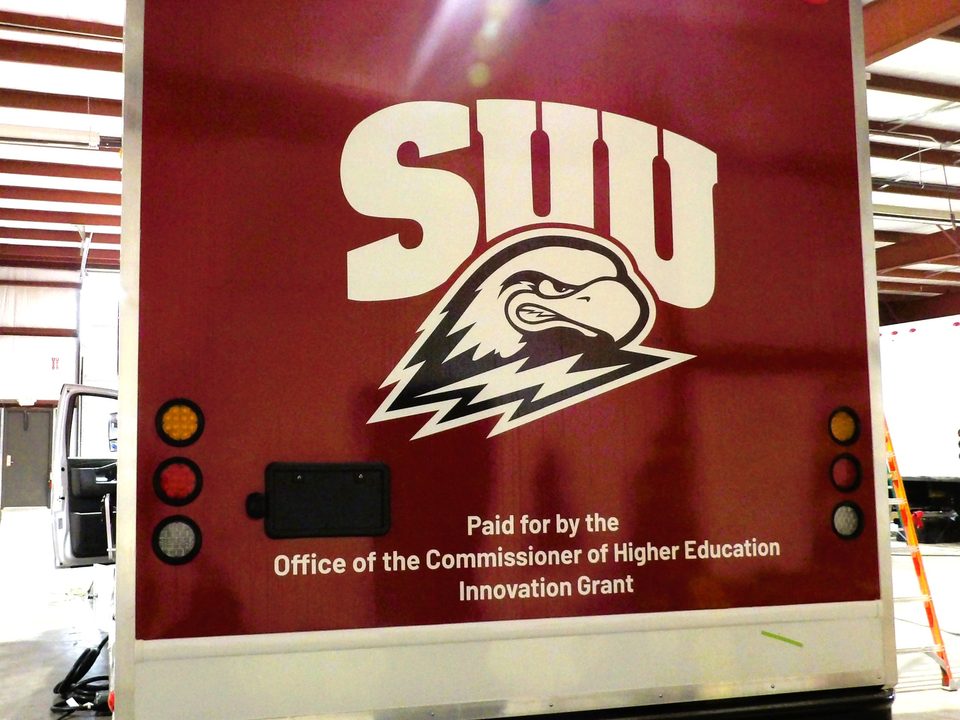 Mobile wellness unit, rear, wrapped