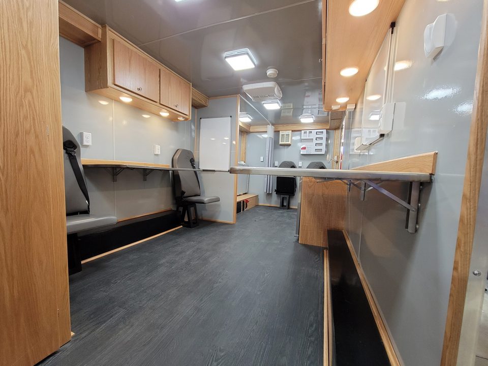 Trailer interior: counters, seating and oak overhead cabinets