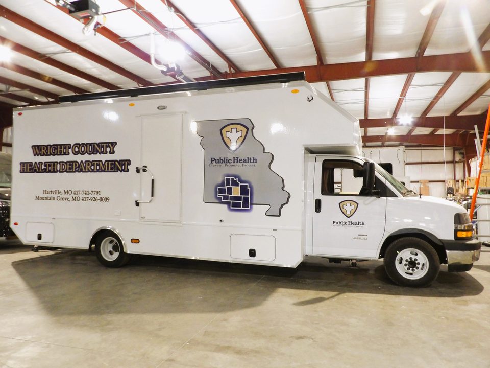 Mobile clinic, driver side, in the plant